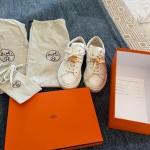 Hermès White Sneakers with Gold Accents
